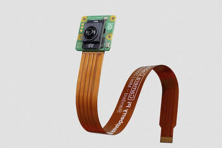 Compact AI camera module with on-sensor neural processing