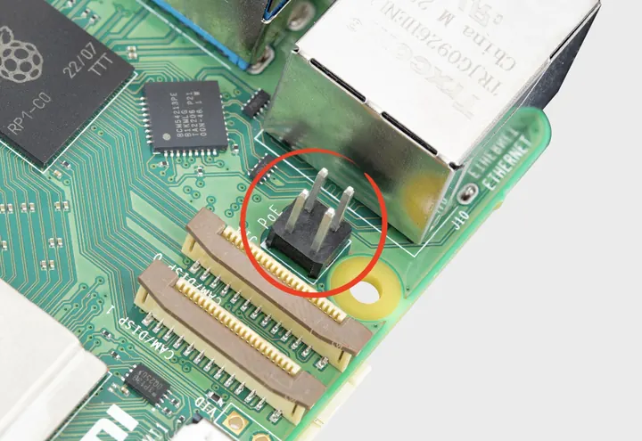 Close-up of a Power over Ethernet board inside an IoT device that hashes and signs sensor records before transmission